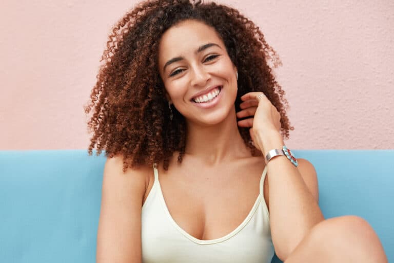 Black woman with a confident beautiful white smile