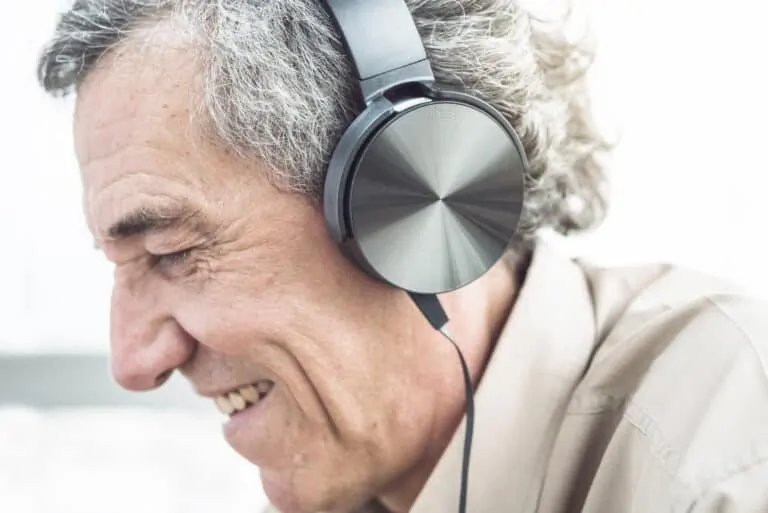 senior man with headphones