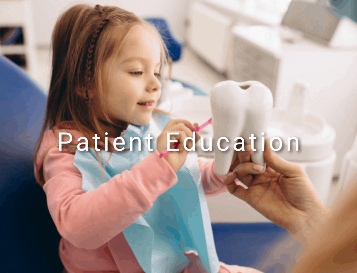 Family Dentistry | Gold Coast Dentist | ArtSmiles 11 dentist educating small child