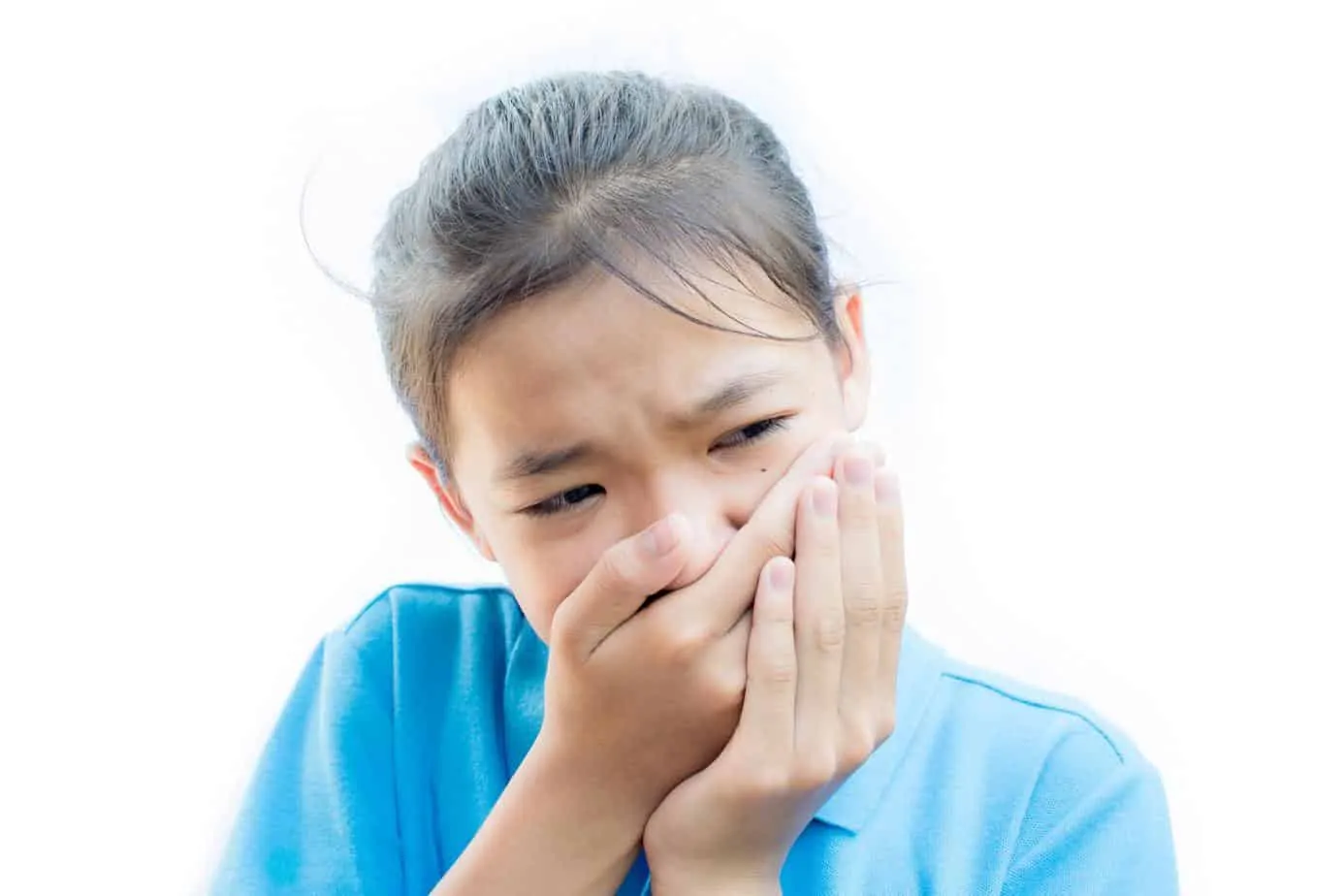 Asian girl felling toothache on white background,Tooth decay and oral health in children.