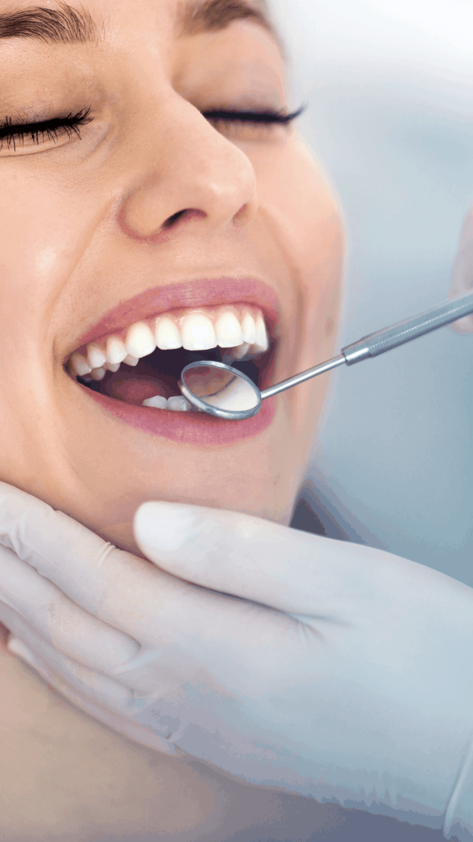 Woman with open mouth at dentist