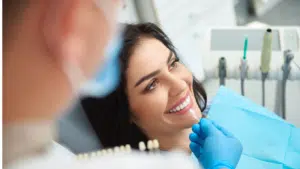 Woman at dental office smilling