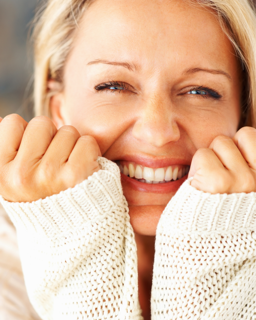 Cheerful middle aged woman smiling